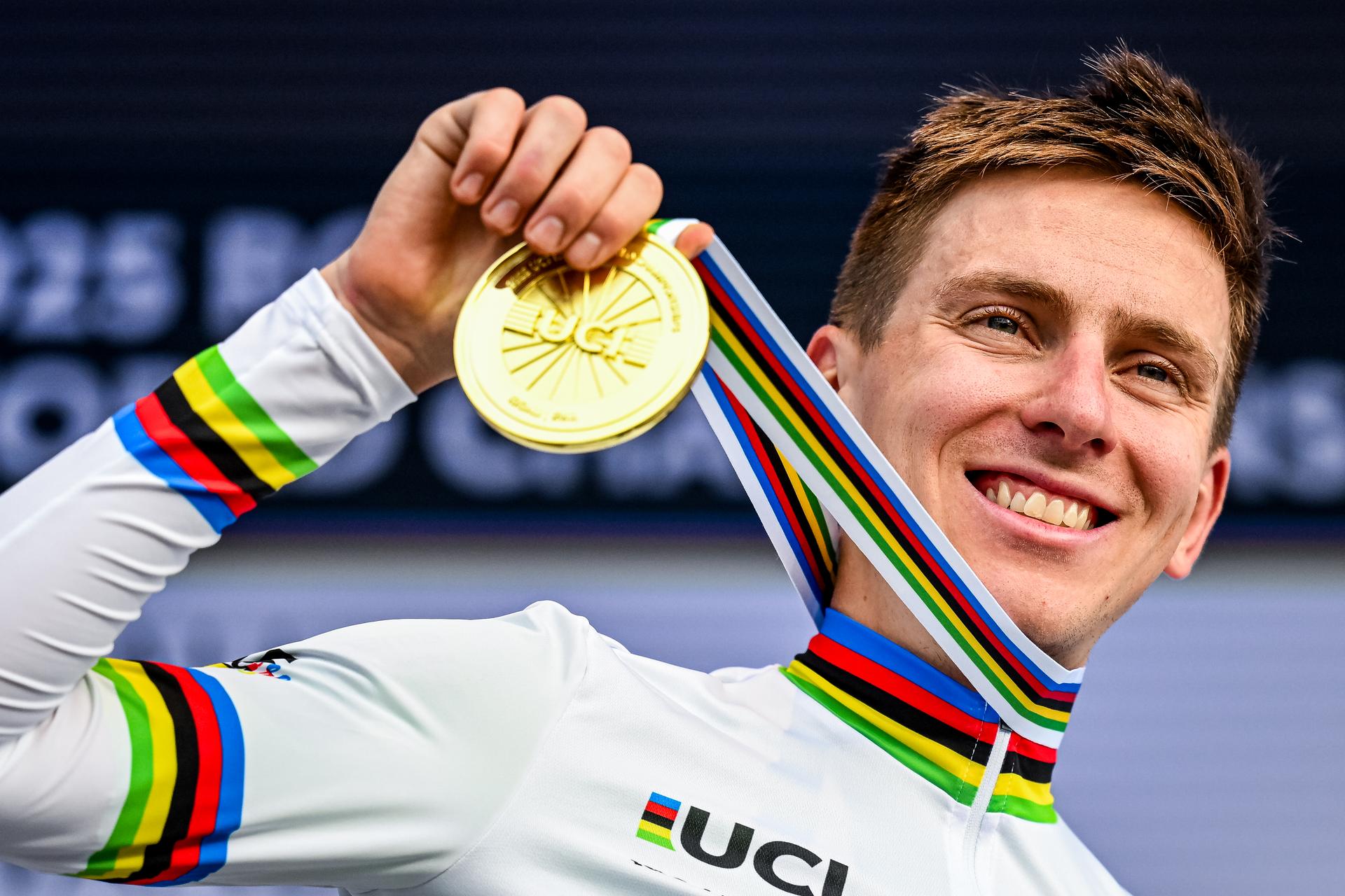 Slovenian Tadej Pogacar pictured on the podium after the elite men road race (267,5 km) at the cycling road World Championships in Kigali, Rwanda, Sunday 28 September 2025. The 2025 UCI Road World Championships take place from 21 to 28 September in Kigali, Rwanda. BELGA PHOTO DIRK WAEM