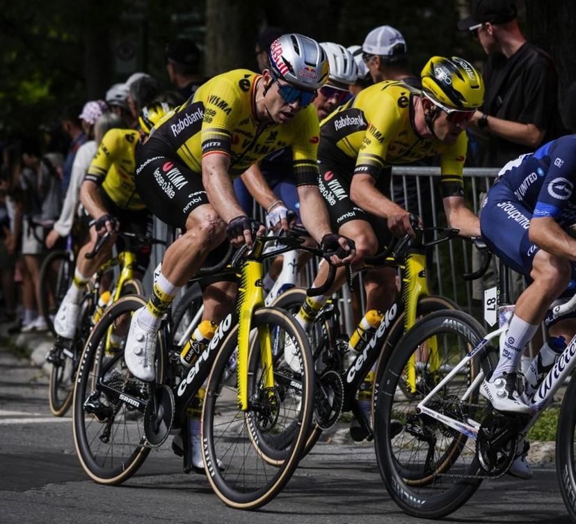 Belgium's Wout van Aert, with Team Visma-Lease a Bike, cycles during the 14th Grand Prix Cycliste de Montreal cycling road race in Montreal, Canada, on September 14, 2025.   MATHIEU BELANGER / AFP
