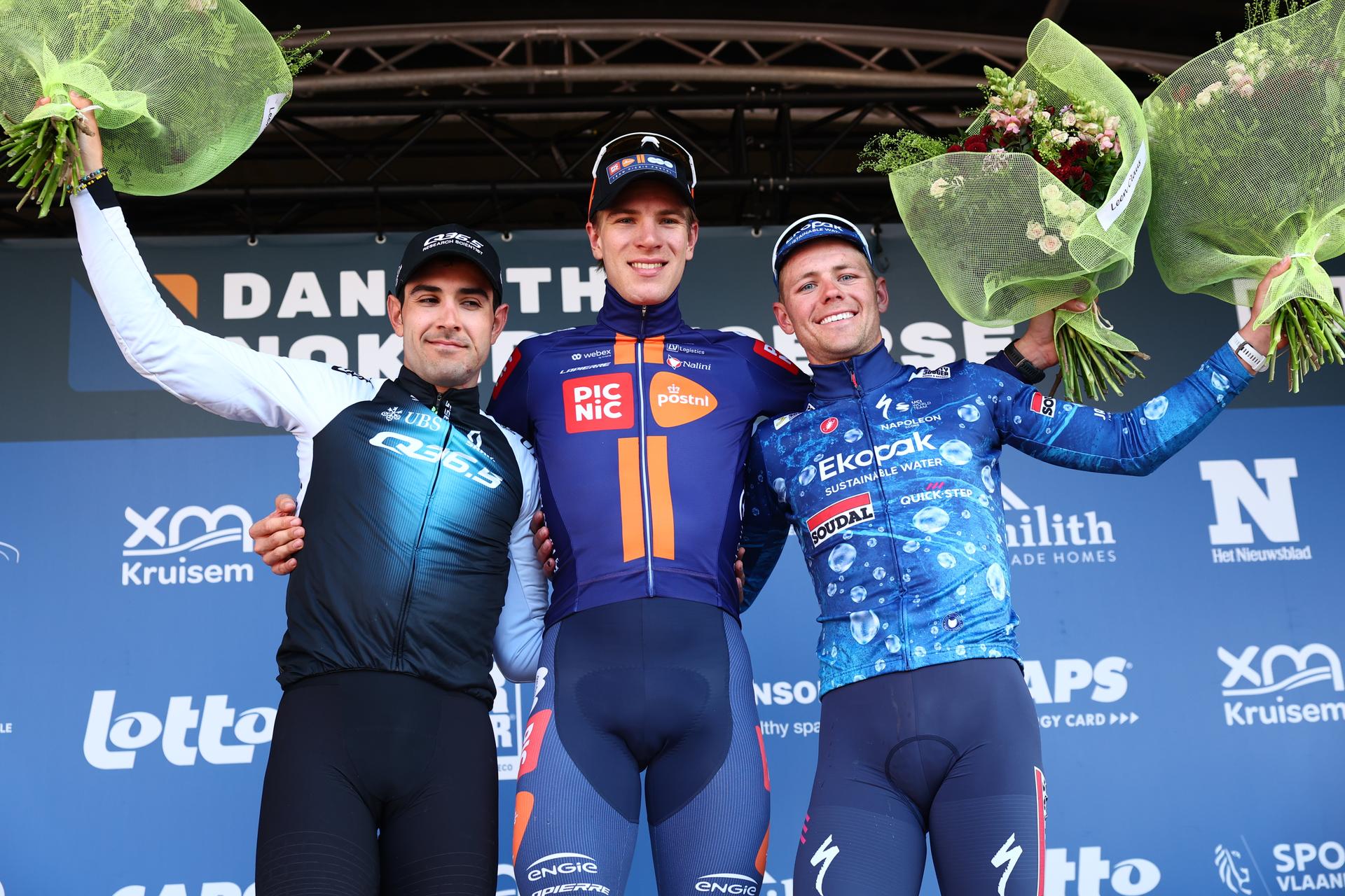 L-R, second Italian Matteo Moschetti of Q36.5 Pro Cycling Team, winner Dutch Nils Eekhoff of Team Picnic PostNL and third US Luke Lamperti of Soudal Quick-Step celebrate on the podium of the 'Nokere Koerse' one day cycling race for men elite, 188.1 km from Deinze to Nokere, on Wednesday 19 March 2025. BELGA PHOTO DAVID PINTENS