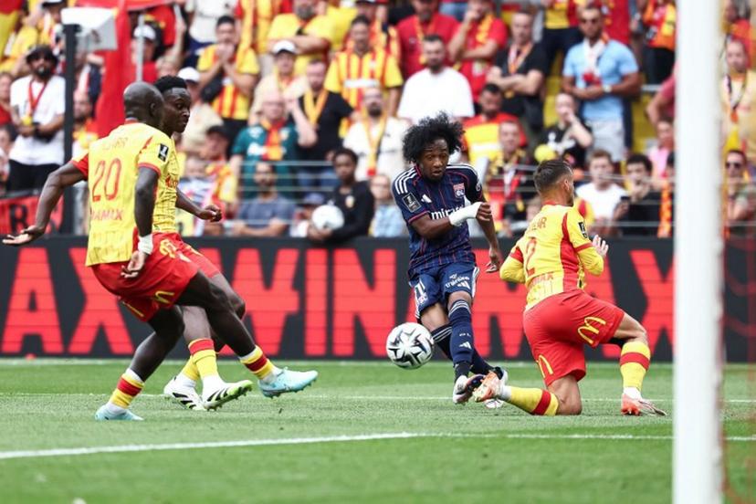 Lyon's Belgian forward #11 Malick Fofana (C) kicks the ball as he tries to score during the French L1 football match between RC Lens and Olympique Lyonnais (OL) at Stade Bollaert-Delelis in Lens, northern France on August 16, 2025.  Sameer Al-DOUMY / AFP