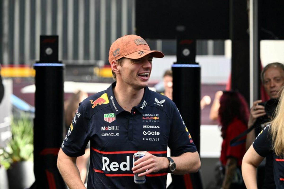 Red Bull Racing's Dutch driver Max Verstappen arrives in the paddock ahead of the United States Formula One Sprint at the Circuit of the Americas in Austin, Texas, on October 18, 2025.  RONALDO SCHEMIDT / AFP