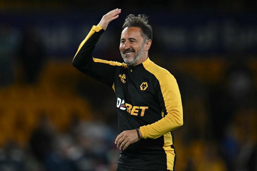 Wolverhampton Wanderers' Portuguese head coach Vitor Pereira celebrates on the pitch after the English League cup second round football match between Wolverhampton Wanderers and West Ham United at the Molineux stadium in Wolverhampton, central England on August 26, 2025. Wolves won the game 3-2. Paul ELLIS / AFP