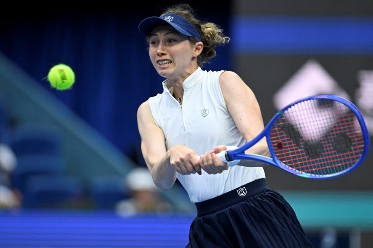 Spain's Cristina Bucsa hits a return to Croatia's Donna Vekic during their women's singles match at the China Open tennis tournament in Beijing on September 25, 2025.  WANG Zhao / AFP