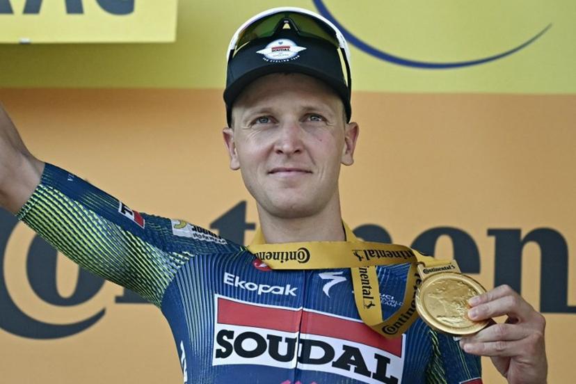 Soudal Quick-Step team's Belgian rider Tim Merlier celebrates on the podium after winning the 8th stage of the 113th edition of the Tour de France cycling race, 182 km between Périgueux and Bergerac in southwestern France, on July 11, 2026.  Loic VENANCE / AFP