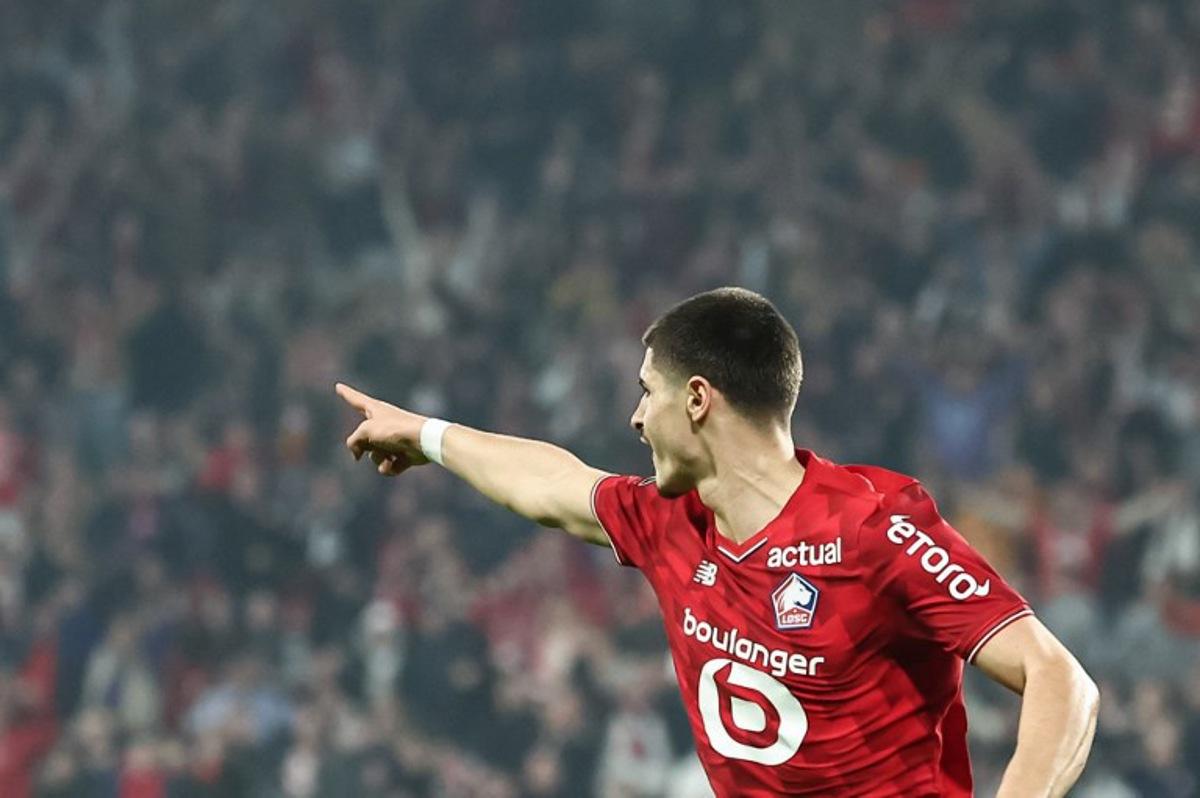Lille's Belgian forward #07 Matias Fernandez-Pardo celebrates scoring his team's first goal during the French L1 football match between Lille OSC and FC Lorient at the Stade Pierre-Mauroy in Villeneuve-d'Ascq, northern France on March 8, 2026.  Sameer Al-DOUMY / AFP