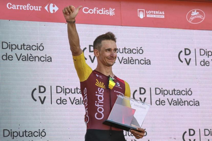 Team Cofidis' French rider Bryan Coquard celebrates on the podium after winning the eighth stage of the Vuelta a Espana 2026, a 171 km race between Pucol and Xeraco on August 29, 2026.    Josep LAGO / AFP