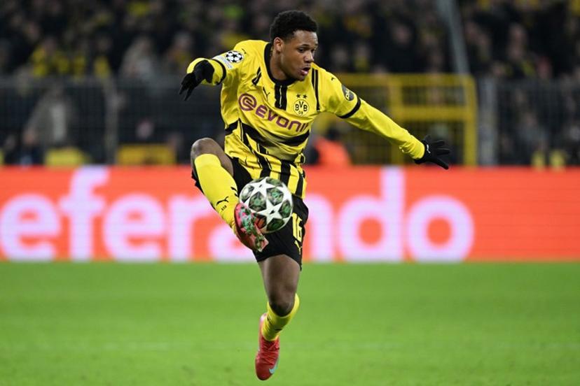 Dortmund's Belgian forward #16 Julien Duranville controls the ball during the UEFA Champions League second-leg knockout round play-off football match BVB Borussia Dortmund vs Sporting CP at the Signal Iduna stadium in Dortmund, western Germany, on February 19, 2025.  UWE KRAFT / AFP