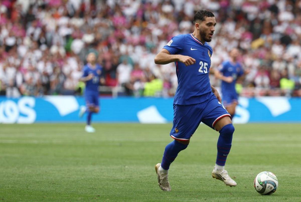 France's forward #25 Rayan Cherki plays the ball during the UEFA Nations League third place play-off football match between Germany and France in Stuttgart, southwestern Germany on June 8, 2025.  FRANCK FIFE / AFP