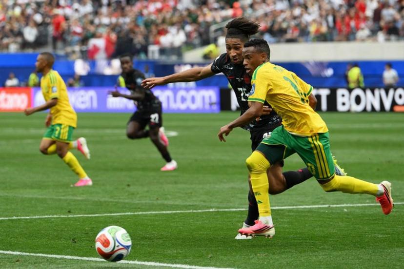 Canada's midfielder #25 Nathan Saliba and South Africa's forward #10 Relebohile Mofokeng fight for the ball during the 2026 World Cup round of 32 football match between South Africa and Canada at the Los Angeles Stadium in Inglewood on June 28, 2026.   Patrick T. Fallon / AFP