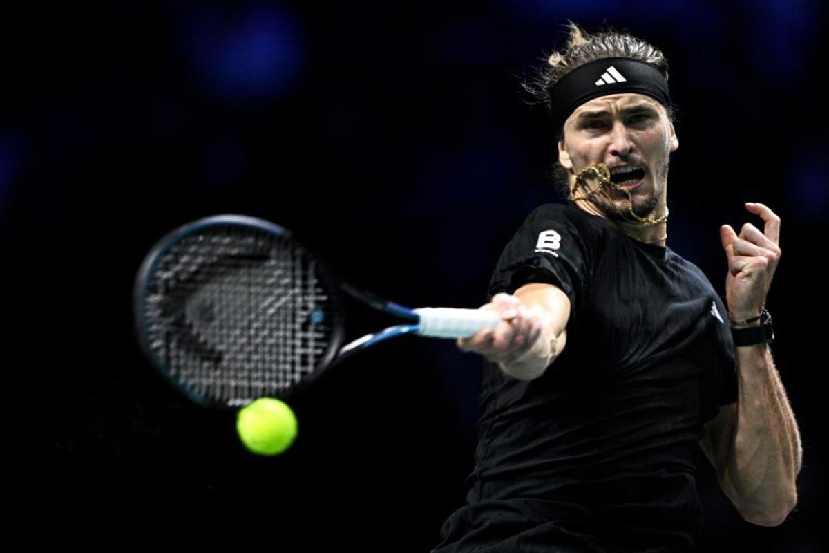 Germany's Alexander Zverev plays a forehand return to Russia's Daniil Medvedev during their men's singles quarter-final match on day five of the Paris ATP Masters 1000 tennis tournament at the Paris La Défense Arena in Nanterre, on the outskirts of Paris, on October 31, 2025.  JULIEN DE ROSA / AFP