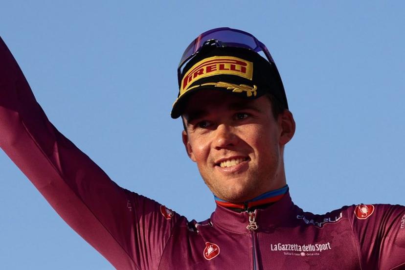 Lidl-Trek's Danish rider Mads Pedersen wearing the cyclamen jersey of best sprinter (Maglia Ciclamino) celebrates on the podium after the 21st and last stage of the 108th Giro d'Italia cycling race of 143kms from Rome to Rome on June 1, 2025.  Luca Bettini / AFP