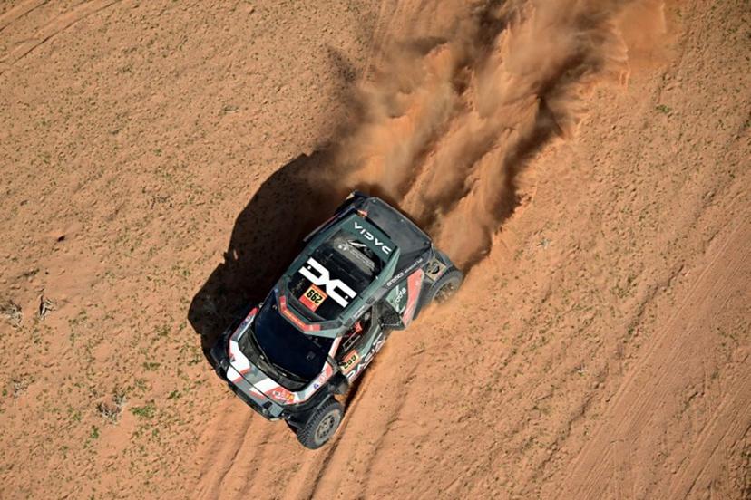 The Dacia Sandriders' Qatari driver Nasser Al-Attiyah and Belgian co-pilot Fabian Lurquin compete in the Stage 5 of the 48th edition of the Dakar Rally 2026, between Al-Ula and Hail, Saudi Arabia, on January 8, 2026.  Giuseppe CACACE / AFP