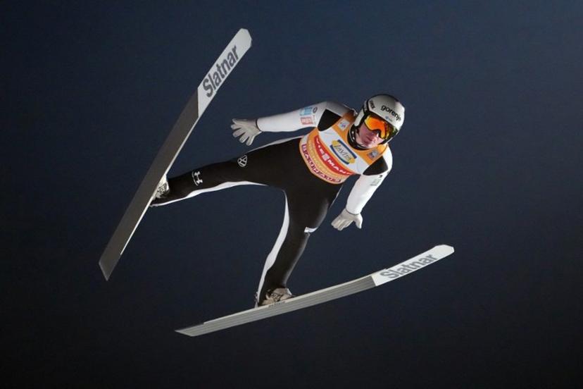 Slovenia's Domen Prevc soars through the air during the Men's Individual Large Hill HS142 event of the FIS Ski Jumping World Cup, the fourth and last leg of the Four Hills Tournament, in Bischofshofen, Austria on January 6, 2026.  GEORG HOCHMUTH / APA / AFP