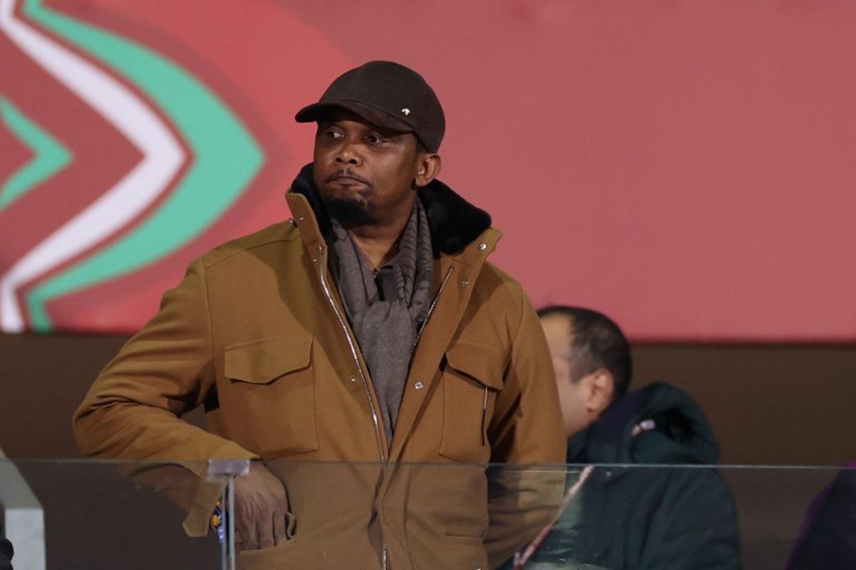 Former Cameroon footballer Samuel Eto'o watches during the Africa Cup of Nations (CAN) round of 16 football match between Ivory Coast and Burkina Faso at the Grand Stadium in Marrakesh on January 6, 2026.   FRANCK FIFE / AFP