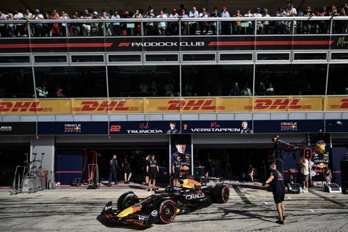 Red Bull Racing's Dutch driver Max Verstappen sits in his car in the pit during the qualifying session ahead of the Italian Formula One Grand Prix at the Autodromo Nazionale Monza circuit, in Monza, northern Italy, on September 6, 2025.  Marco BERTORELLO / POOL / AFP