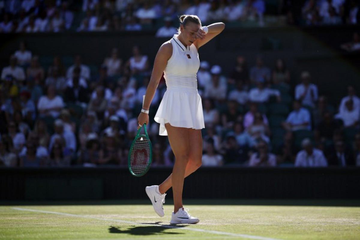 US player Amanda Anisimova reacts as she plays against US player Madison Keys during their women's singles third round tennis match on the sixth day of the 2026 Wimbledon Championships at The All England Lawn Tennis and Croquet Club in Wimbledon, southwest London, on July 4, 2026.  Henry NICHOLLS / AFP