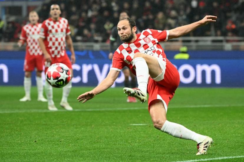 Girona's Dutch defender #17 Daley Blind kicks the ball during the UEFA Champions League football match between AC Milan and Girona at San Siro stadium in Milan, on January 22, 2025.  Alberto PIZZOLI / AFP