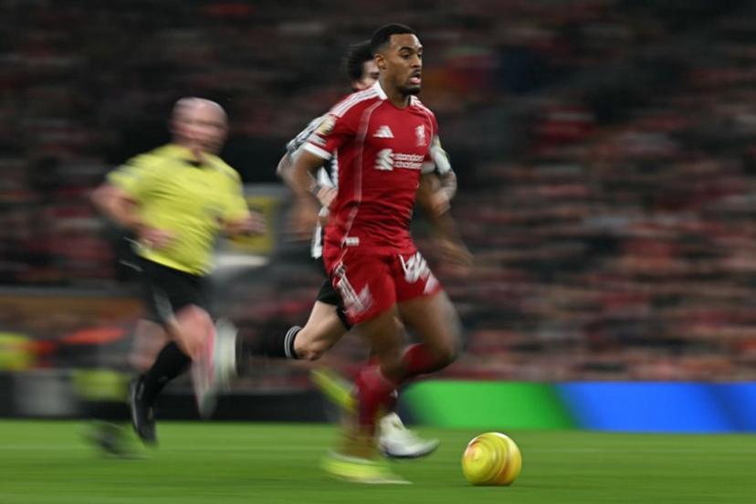 Liverpool's Dutch midfielder #38 Ryan Gravenberch runs with the ball during the English Premier League football match between Liverpool and Newcastle United at Anfield in Liverpool, north west England on January 31, 2026.  Paul ELLIS / AFP