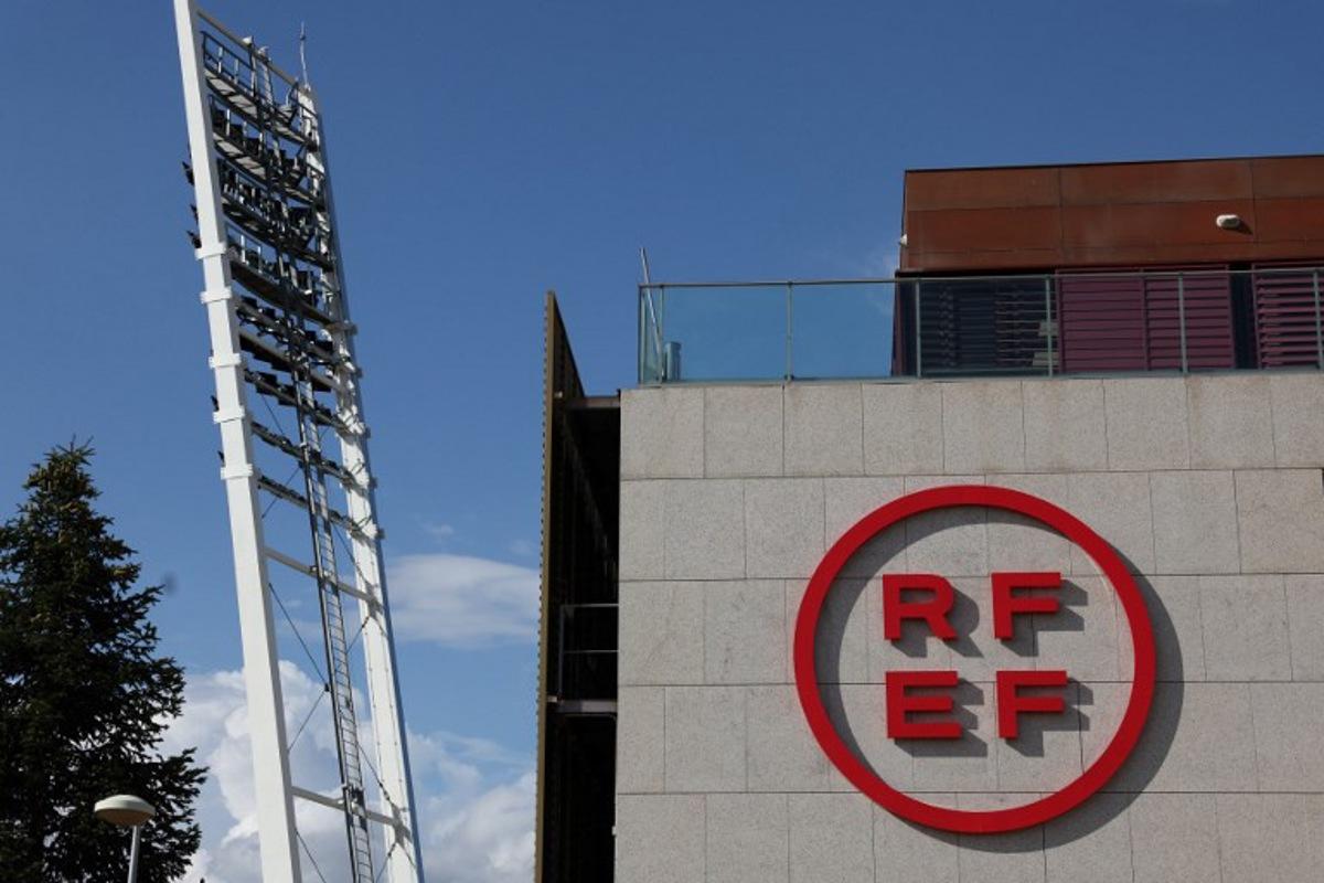 A picture taken on September 15, 2023 shows the logo on the headquarters of the Spanish Royal Football Federation (RFEF) in Las Rozas de Madrid. Women's World Cup winners on September 15 said they would not don the national shirt without deeper changes within the RFEF. Despite a string of recent changes, the federation remains in the hands of officials appointed by Rubiales, former Spain's football chief who faces trial on sexual assault charges over forcibly kissing women's World Cup player Jenni Hermoso.  Pierre-Philippe MARCOU / AFP