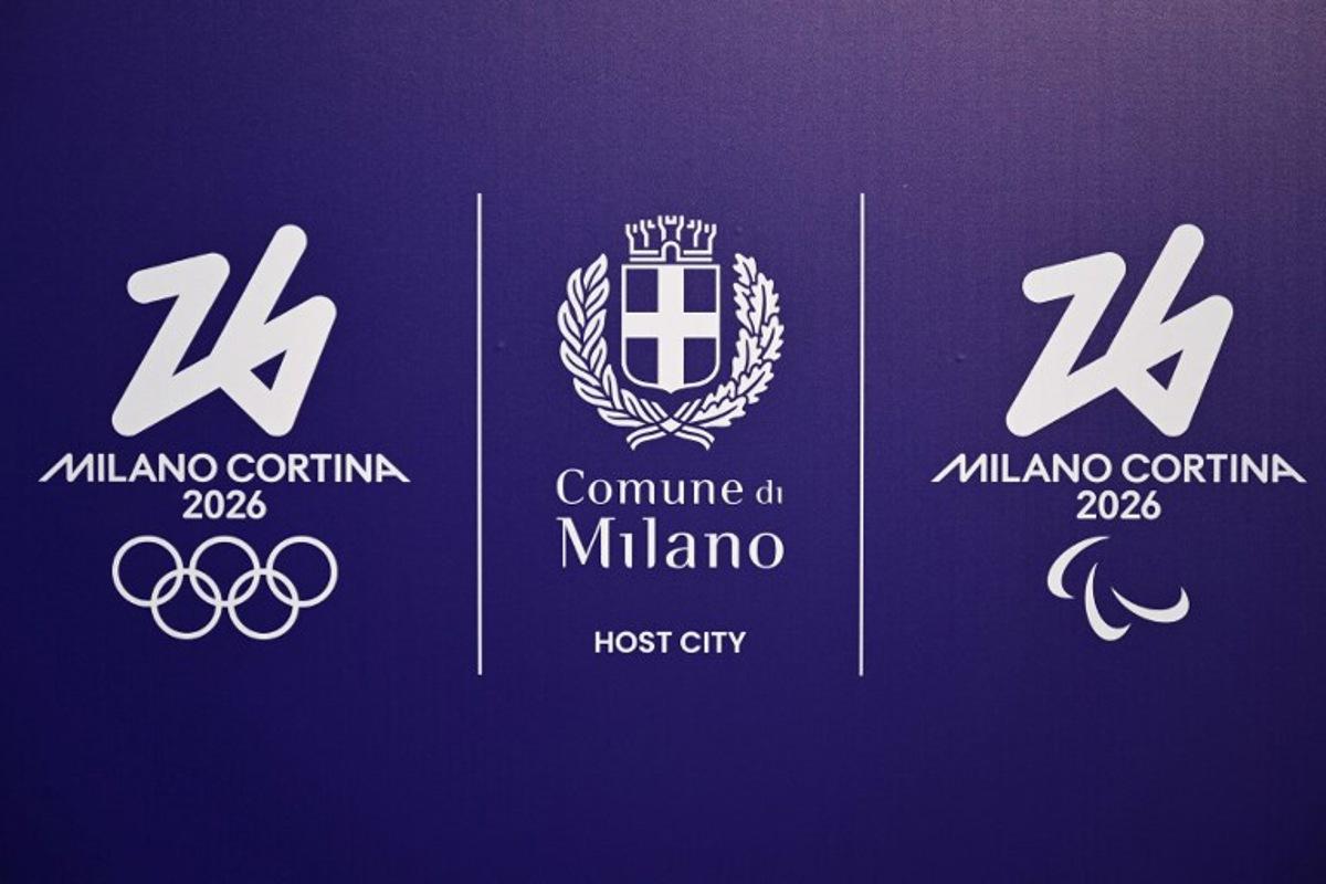 This photograph shows a board bearing the logo of the Winter Olympic and Paralympic Games "Milano Cortina 2026" with the coat of arms of Milan (C), in Milan, on February 6, 2025. The Italian Winter Olympic and Paralympic Games Milano Cortina 2026. Winter Olympic Games will take place from February 6 to 22 and Winter Paralympic Games from March 6 to 22. MARCO BERTORELLO / AFP