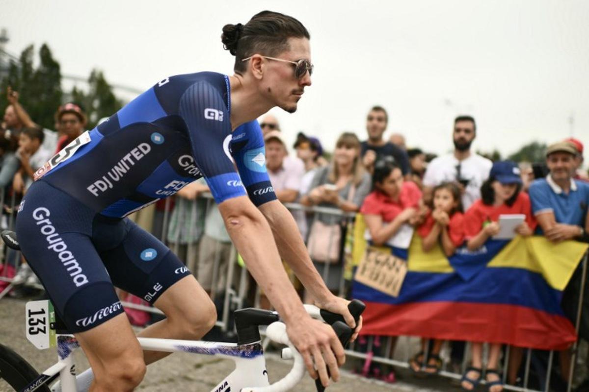 Team Groupama-FDJ's French rider David Gaudu arrives to compete in the second stage of the Vuelta a Espana, a 159,6 km race between Alba and Limone Piemonte, in Italy's Piemonte region, on August 24, 2025.    Marco BERTORELLO / AFP
