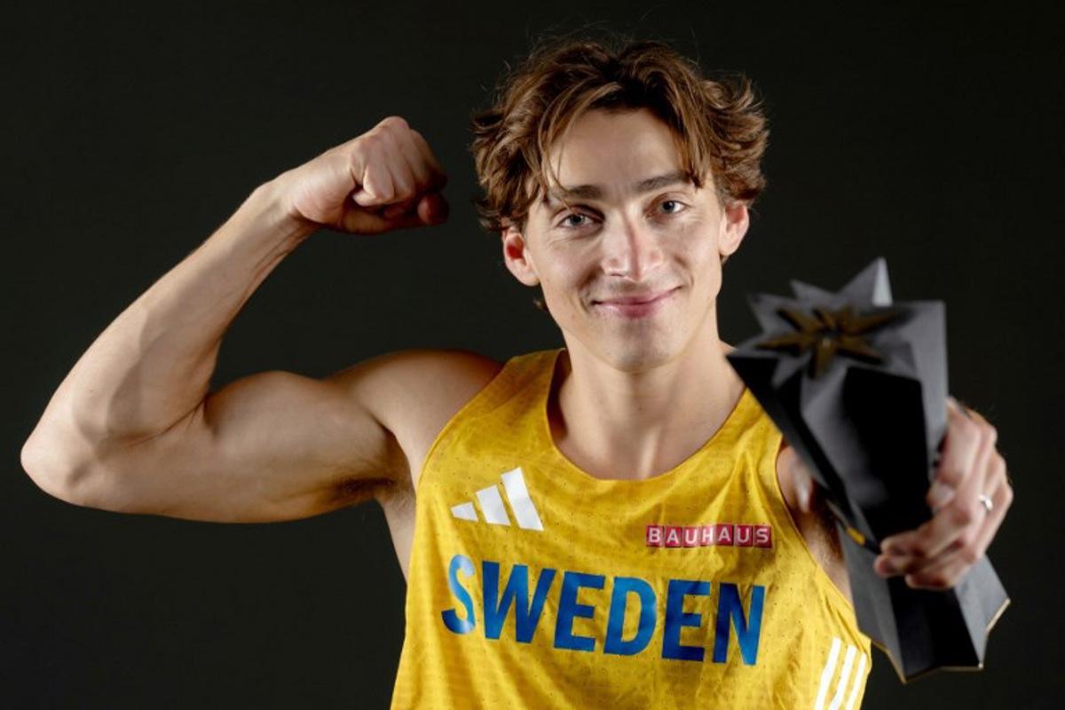 Sweden's Armand Duplantis, winner of the pole vault men competition, poses with his trophy for a photo during a studio photo session on the sidelines of the World Athletics Ultimate Championship at the Gyula Zsivotzky National Athletics Centre in Budapest on September 11, 2026.  Andrej ISAKOVIC / AFP