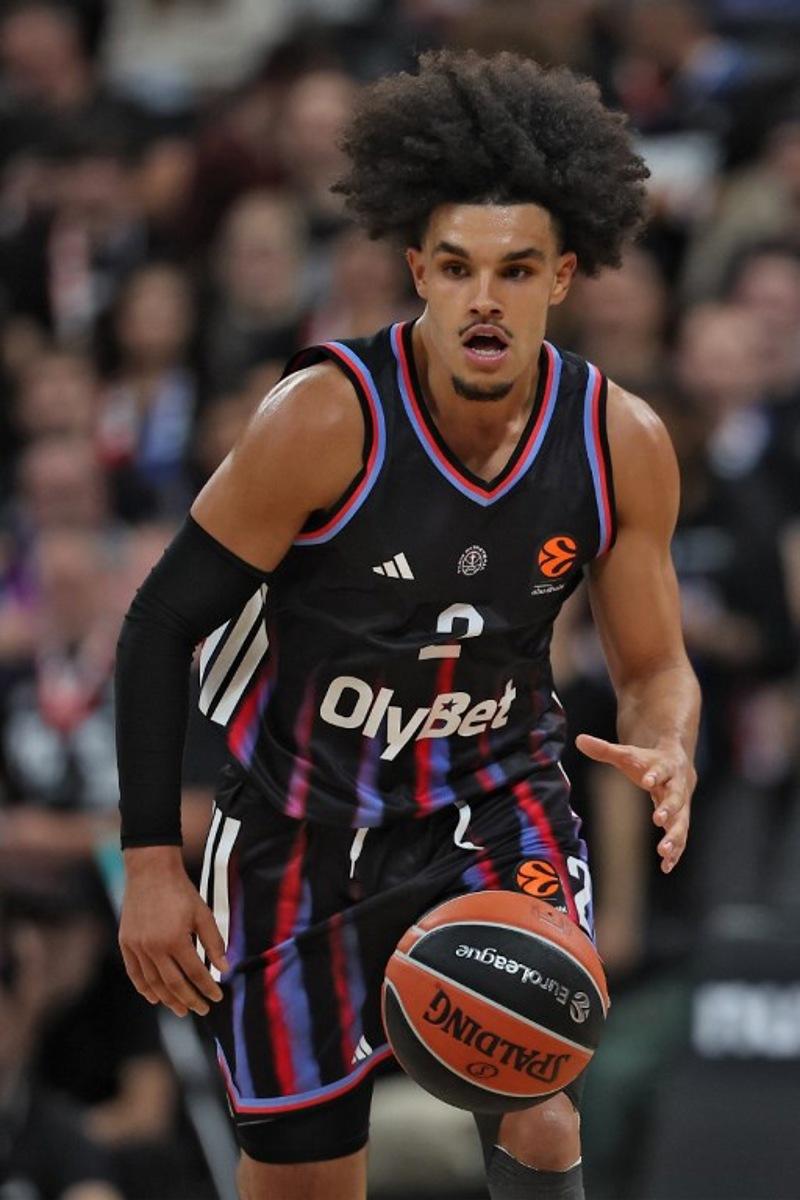 Paris Basketball's French-Algerian guard #02 Nadir Hifi runs with the ball during the Euroleague basketball match between Paris Basketball and Virtus Bologna at the Adidas Arena, in Paris, on October 9, 2025.  Anne-Christine POUJOULAT / AFP