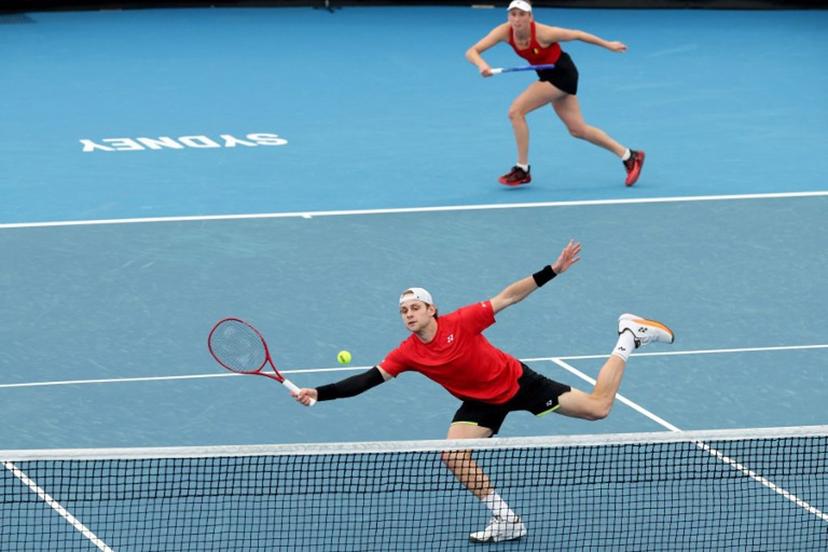 Belgium's Zizou Bergs (L) and Elise Mertens hit a return to China's Zhang Zhizhen and Zhu Lin during their mixed doubles match at the United Cup tennis tournament on Ken Rosewall Arena in Sydney on January 3, 2026.  DAVID GRAY / AFP