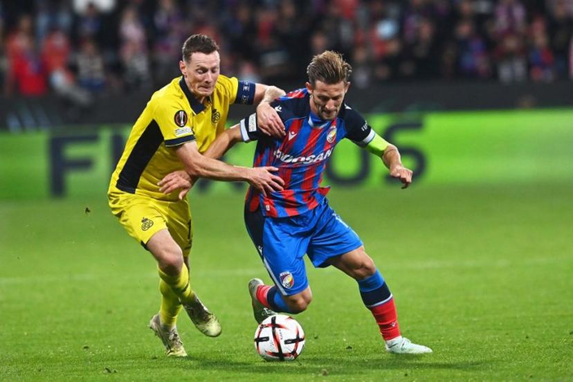Viktoria Plzen's Slovak midfielder #17 Patrik Hrosovsky and Union SG's Belgian midfielder #17 Rob Schoofs vie for the ball during the UEFA Europa League first round day 1 football match between FC Viktoria Plzen and Royale Union Saint-Gilloise in Plzen, Czech Republic, on September 17, 2026.   Michal Cizek / AFP