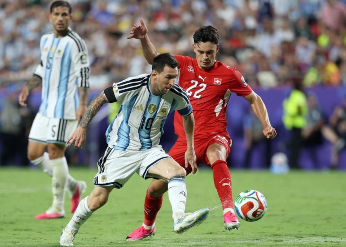 Argentina's forward #10 Lionel Messi and Switzerland's forward #22 Fabian Rieder fight for the ball during the 2026 World Cup football tournament quarter-final match between Argentina and Switzerland at the Kansas City Stadium in Kansas City on July 11, 2026.   Thomas COEX / AFP