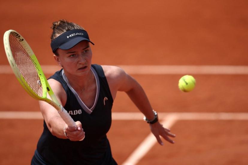Czech Republic's Barbora Krejcikova plays a backhand return to Russia's Veronika Kudermetova during their women's singles match on day 5 of the French Open tennis tournament at the Roland-Garros Complex in Paris on May 29, 2025.  Anne-Christine POUJOULAT / AFP