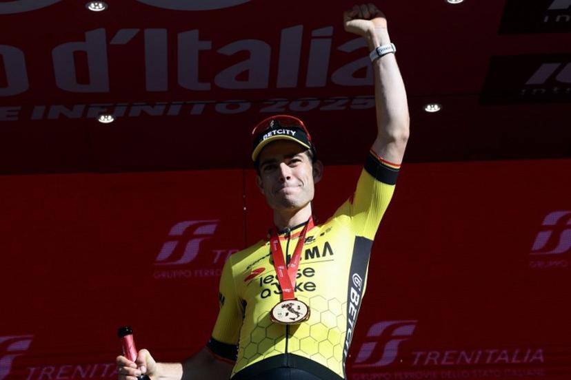 Team Visma-Lease a Bike's Belgian rider Wout Van Aert celebrates on the podium after winning the 9th stage of the 108th Giro d'Italia cycling race of 181kms from Gubbio to Siena on May 18, 2025.  Luca Bettini / AFP