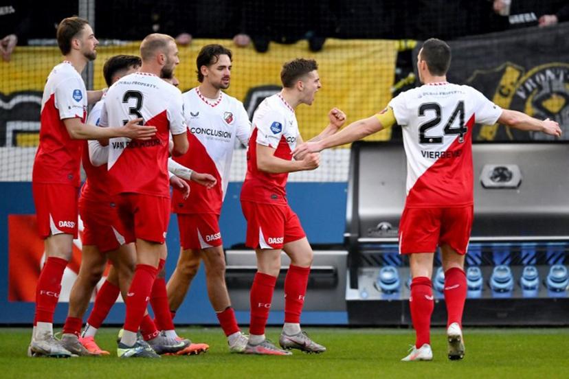 Utrecht's Danish midfielder #22 Oscar Fraulo (2nd R) celebrates after scoring a goal during the Dutch Eredivisie first division football match between FC Utrecht and NAC Breda at the Galgenwaard stadium in Utrecht in Utrecht on March 1, 2025.  Gerrit van Keulen / ANP / AFP