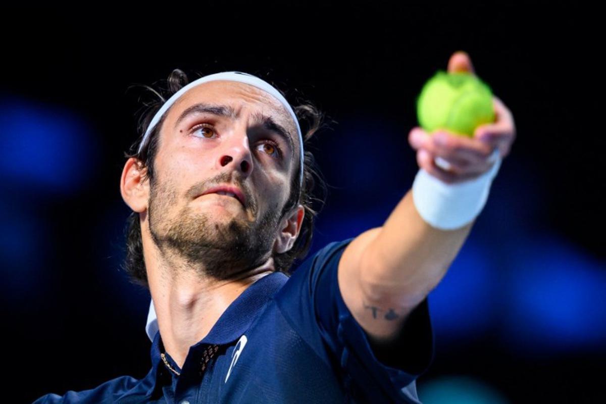 Italy's Lorenzo Musetti serves the ball to Germany's Alexander Zverev during the men's semi-final singles match at the ATP Vienna Open tennis tournament in Vienna, Austria, on October 25, 2025.  MAX SLOVENCIK / APA / AFP