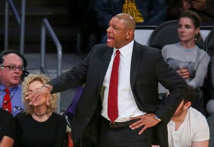 Los Angeles Clippers head coach Doc Rivers directs his team during a NBA game against Los Angeles Lakers at Staples Center in Los Angeles, California on December 25, 2016.  
RINGO CHIU / AFP