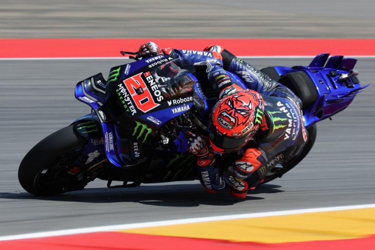 Monster Energy Yamaha MotoGP's French rider Fabio Quartararo takes a curve during the first free practice session of the MotoGP Aragon Grand Prix at the Motorland circuit in Alcaniz, northeastern Spain, on June 6, 2025.   LLUIS GENE / AFP