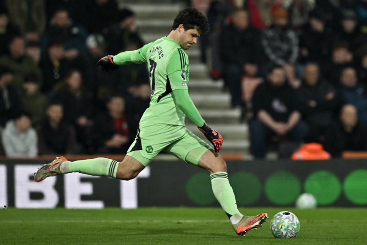 Manchester United's Belgian goalkeeper #31 Senne Lammens clears the ball during the English Premier League football match between Bournemouth and Manchester United at the Vitality Stadium in Bournemouth, southern England on March 20, 2026.  Glyn KIRK / AFP