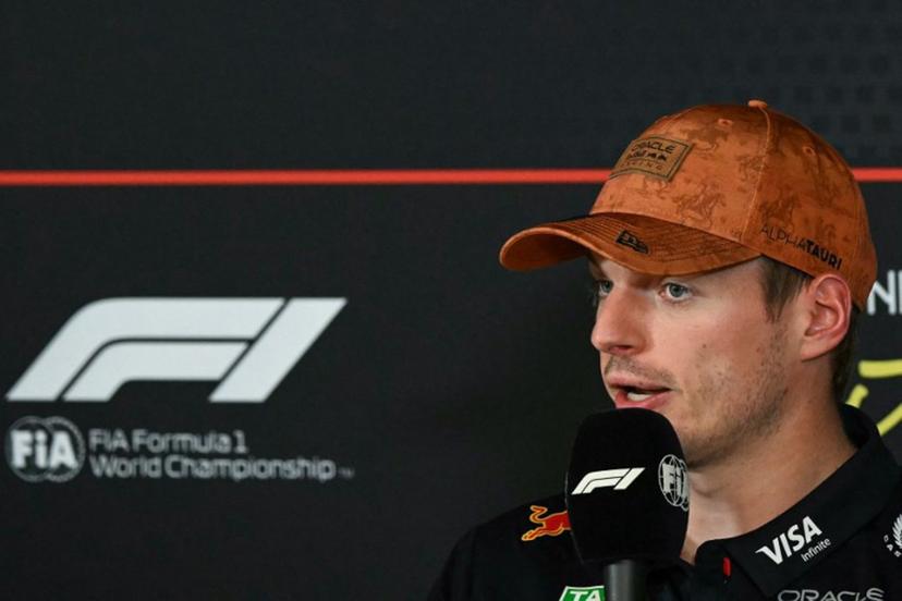 Red Bull Racing's Dutch driver Max Verstappen speaks to the media after winning the pole position during the qualifying session for the United States Formula One Grand Prix at the Circuit of the Americas in Austin, Texas, on October 18, 2025.  RONALDO SCHEMIDT / AFP