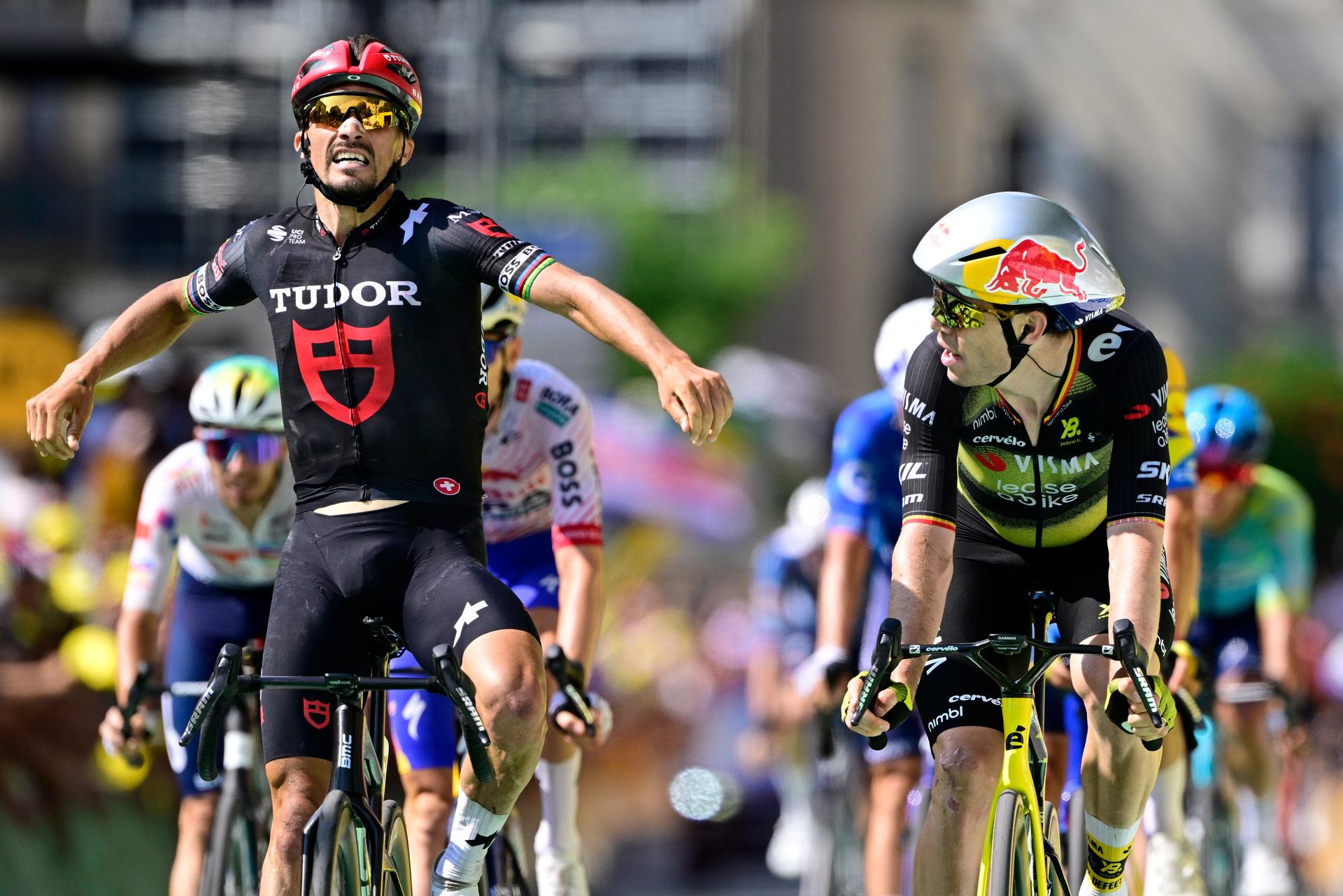 Belgian Wout van Aert of Team Visma-Lease a Bike looks at French Julian Alaphilippe of Tudor Pro Cycling Team at the finish of stage 15 of the 2025 Tour de France cycling race, from Muret to Carcasonne (169 km), on Sunday 20 July 2025 in France. The 112th edition of the Tour de France starts on Saturday 5 July in Lille, France, and will finish in Paris, France on the 27th of July.   BELGA PHOTO DIRK WAEM