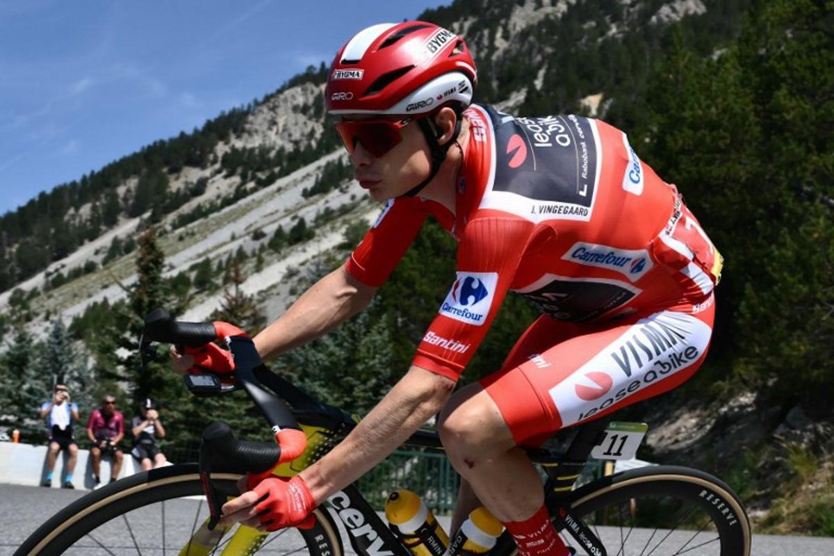 Team Visma-Lease a bike's Danish rider Jonas Vingegaard rides during the fourth stage of the Vuelta a Espana, a 192 km race between Susa and Voiron, in the Alps, on August 26, 2025.    Marco BERTORELLO / AFP
