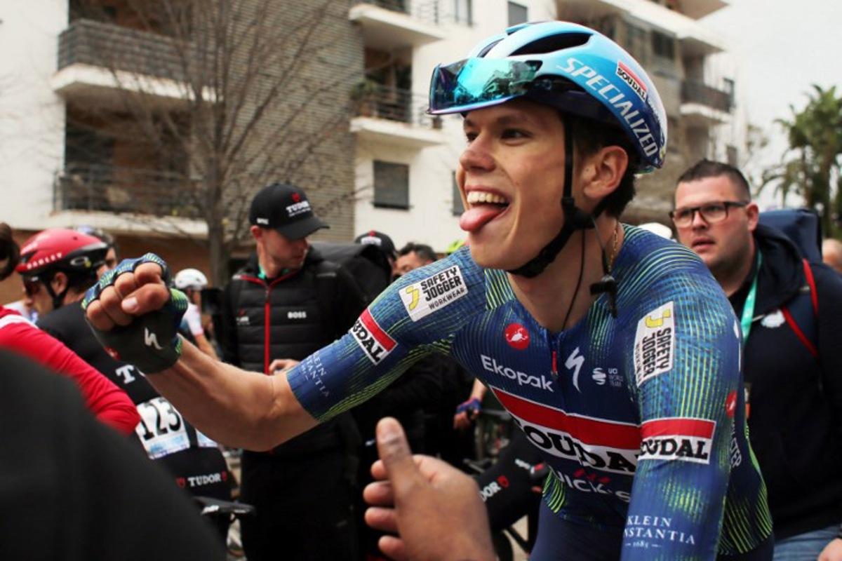 Soudal Quick-Step French cyclist Paul Magnier celebrates winning the first stage of the 52nd edition of the Volta ao Algarve, a 183.5 km race between Vila Real de Santo Antonio and Tavira, on February 18, 2026. João Matos / AFP
