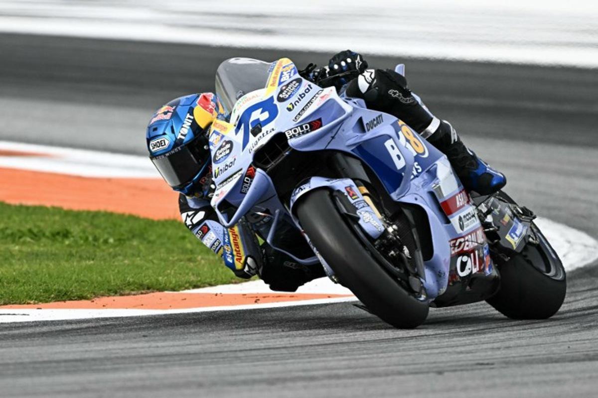 BK8 Gresini Racing MotoGP team's Spanish MotoGP rider Alex Marquez competes in the sprint race ahead of the MotoGP Valencia Grand Prix at the Ricardo Tormo racetrack in Cheste on November 15, 2025. JOSE JORDAN / AFP
