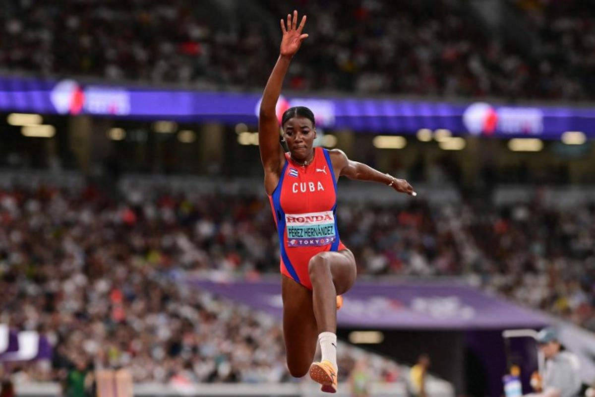 Cuba's athlete Leyanis Perez Hernandez competes in the women's triple jump final during the World Athletics Championships in Tokyo on September 18, 2025. Ben STANSALL / AFP