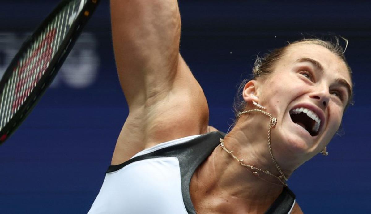 Belarus's Aryna Sabalenka serves to Switzerland's Rebeka Masarova during their women's singles first round tennis match on day one of the US Open tennis tournament at the USTA Billie Jean King National Tennis Center in New York City, on August 24, 2025. TIMOTHY A. CLARY / AFP