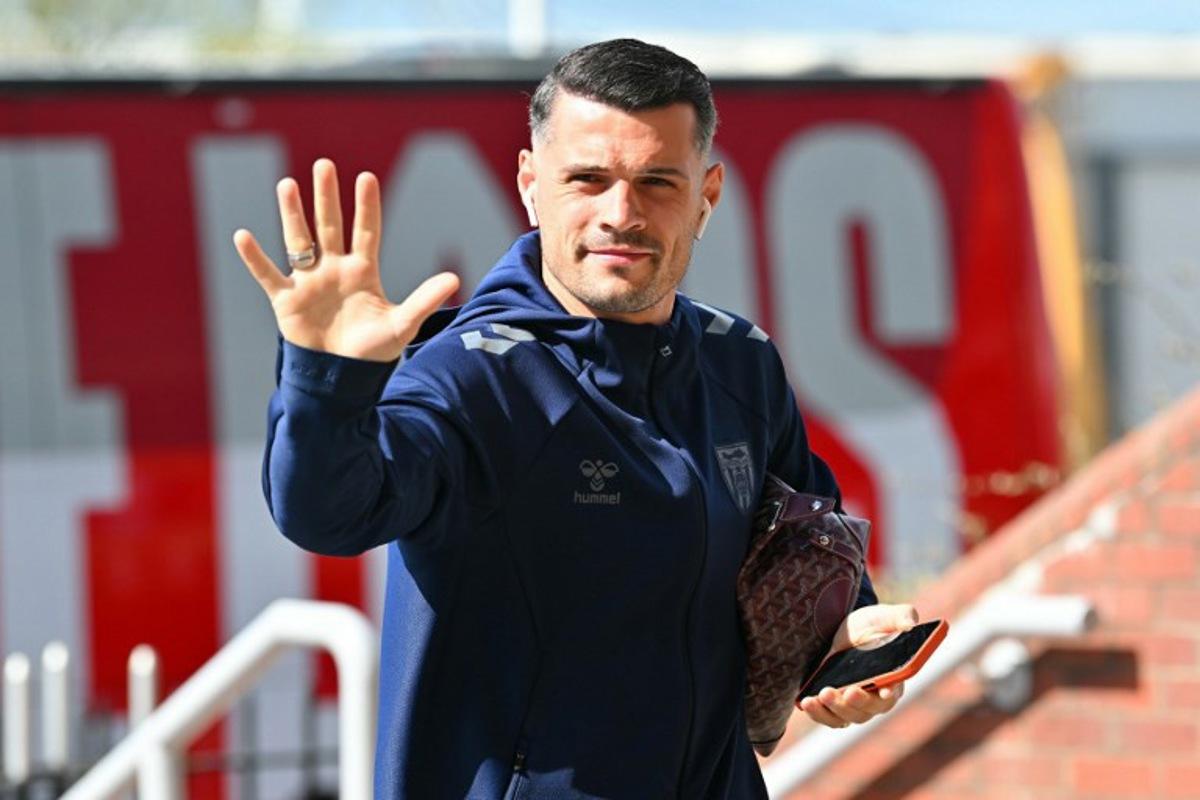 Sunderland's Swiss midfielder #34 Granit Xhaka arrives for the English Premier League football match between Sunderland and Tottenham Hotspur at The Stadium of Light in Sunderland in north east England on April 12, 2026. ANDY BUCHANAN / AFP