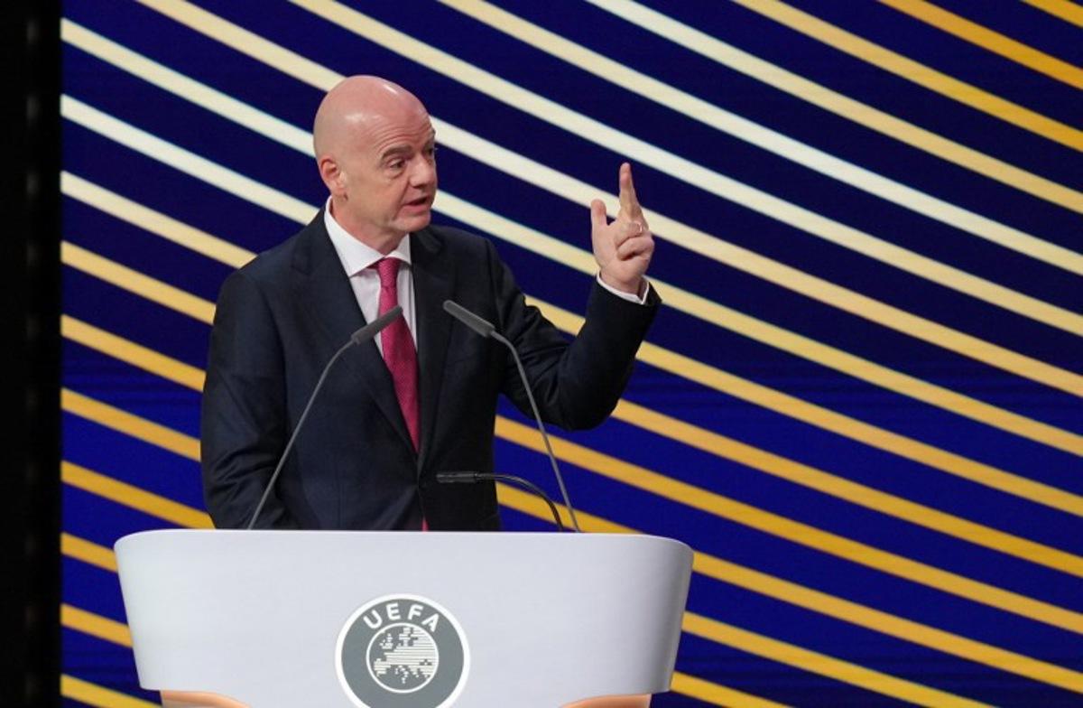 FIFA President Gianni Infantino gestures as he addresses the 50th UEFA Ordinary Congress in Brussels on February 12, 2026. Pau BARRENA / AFP