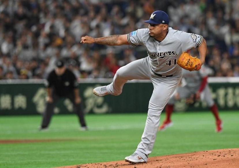 Milwaukee Brewers' Junior Guerra pitches during the first inning of the first exhibition baseball game between the US Major League Baseball All Star team and the Japanese national team at the Tokyo Dome in Tokyo on November 9, 2018. TOSHIFUMI KITAMURA / AFP