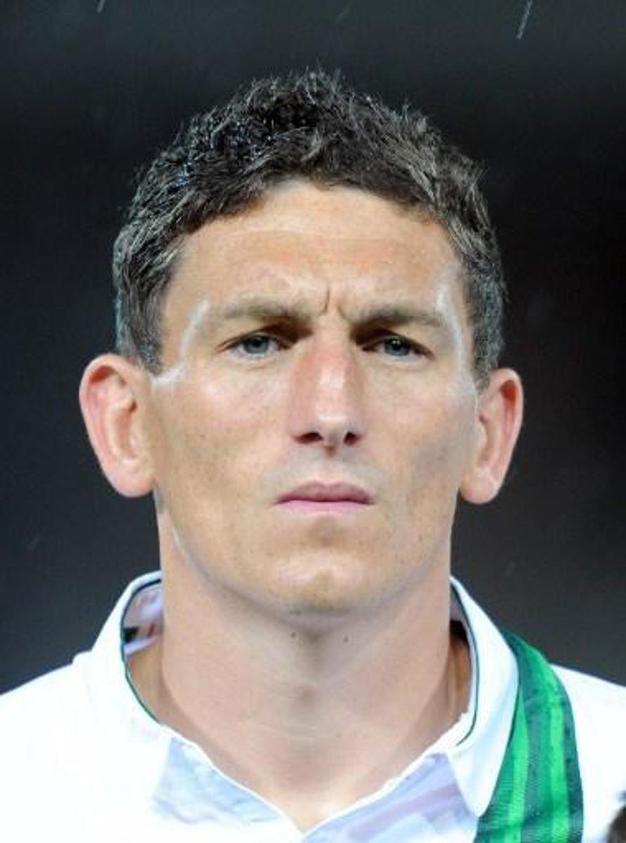 Ireland's striker Keith Andrews listens to the national anthem prior to the friendly match against Hungary at Budapest's Puskas Stadium on June 4, 2012 ahead of the Euro 2012 football championship, taking place in Poland and Ukraine from June 8 to July 1. AFP PHOTO / ATTILA KISBENEDEK