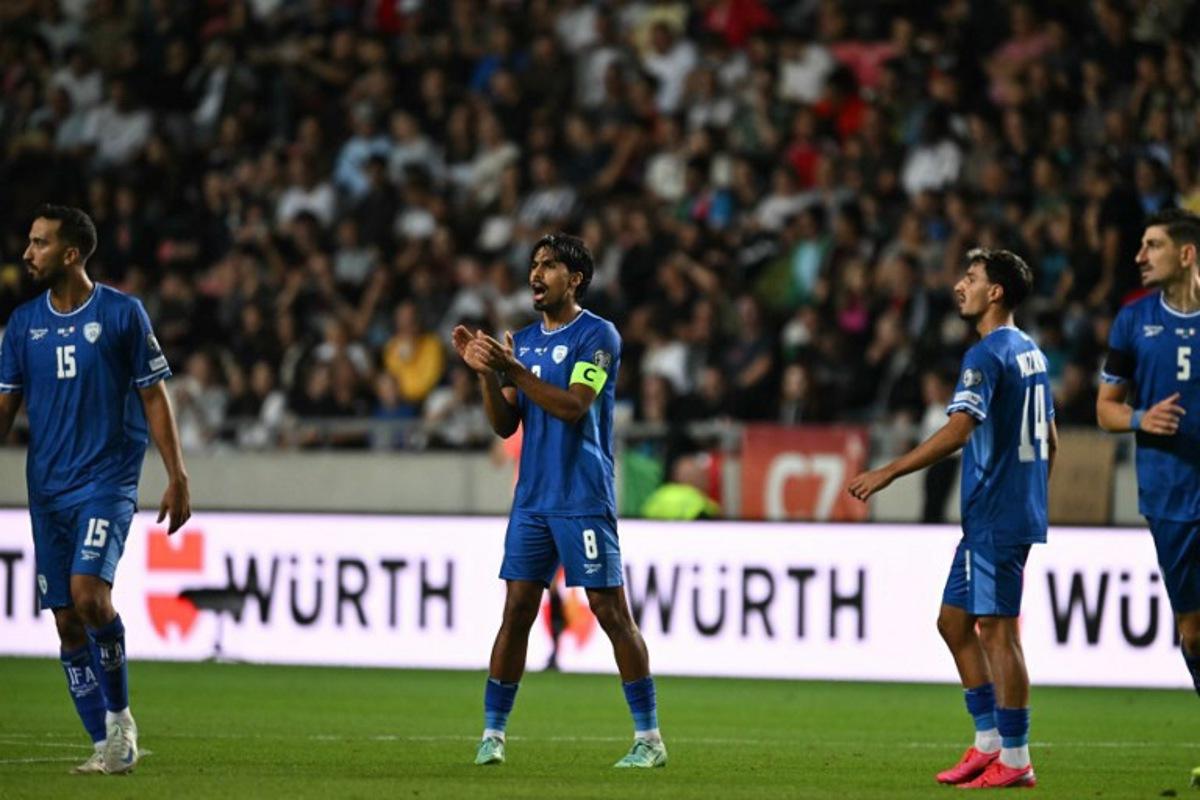 Israel's midfielder #08 Dor Peretz (C) celebrates after scoring the 404 goal during the 2026 World Cup qualifiers Europe zone group I football match between Israel and Italy on September 8, 2025 in Debrecen, Hungary. Attila KISBENEDEK / AFP