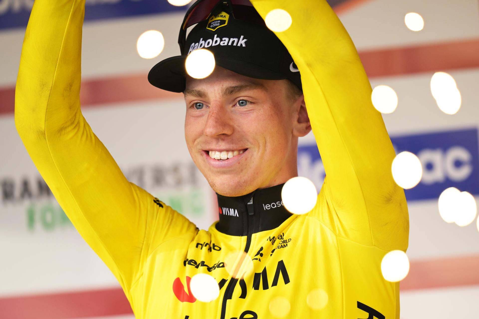 Great Britain's Matthew Brennan of Team Visma-Lease a Bike celebrates on the podium after winning the 78th edition of the men elite race of the Kuurne-Brussels-Kuurne one day cycling race, 195 km from Kuurne to Kuurne via Brussels, Sunday 01 March 2026. BELGA PHOTO DAVID PINTENS